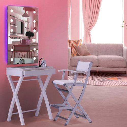 Small white dressing table with lighted mirror and chair